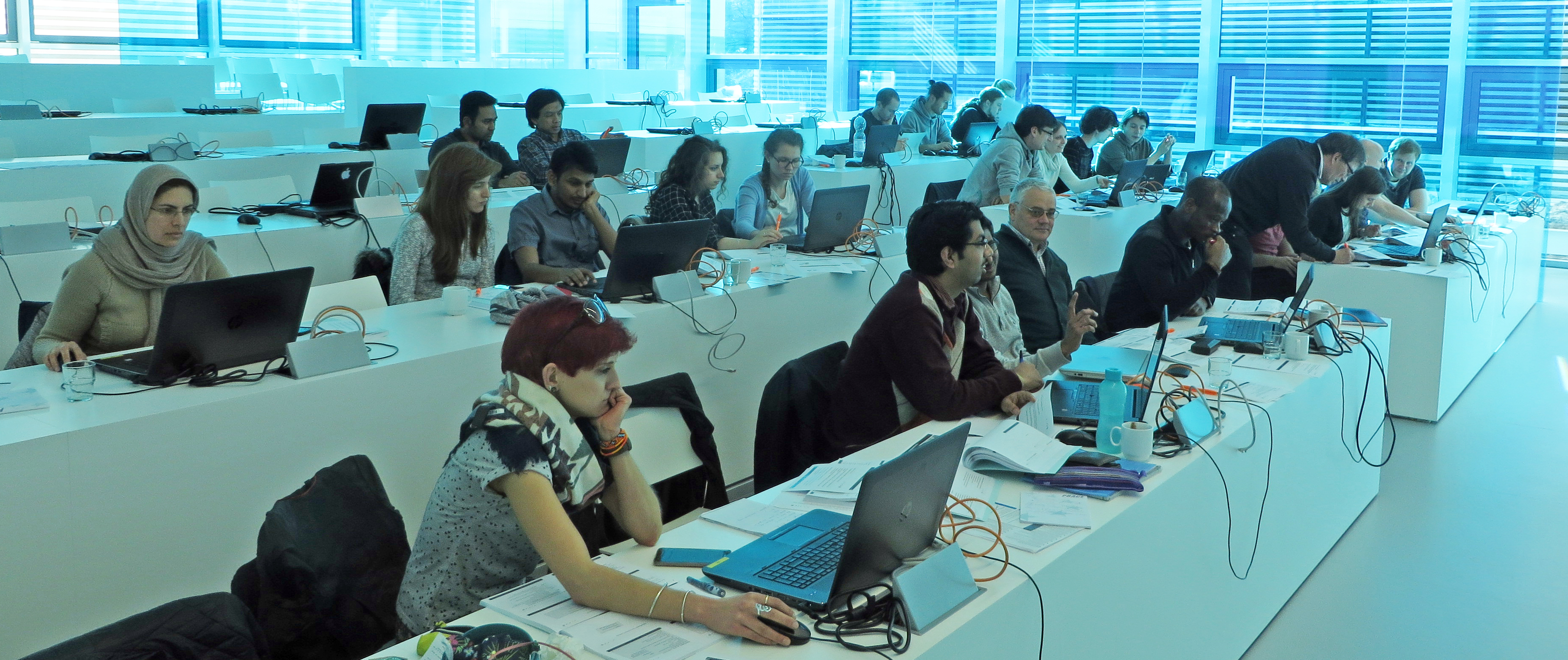 Photo of scientists participating in a training course in HLRS's Ruehle Saal